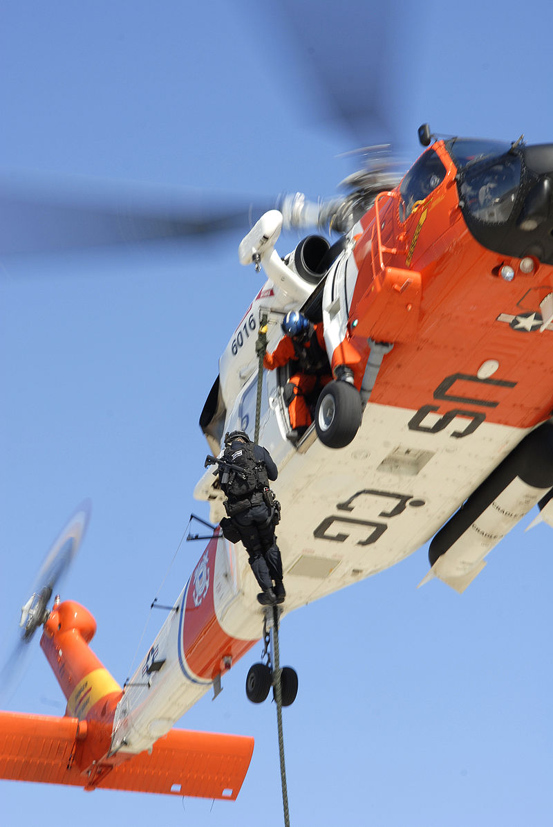 A LEDET member participates in a fast-rope vertical insertion exercise from a Coast Guard HH-60 “Jayhawk” helicopter. (U.S. Coast Guard) A LEDET member participates in a fast-rope vertical insertion exercise from a Coast Guard HH-60 “Jayhawk” helicopter. (U.S. Coast Guard)